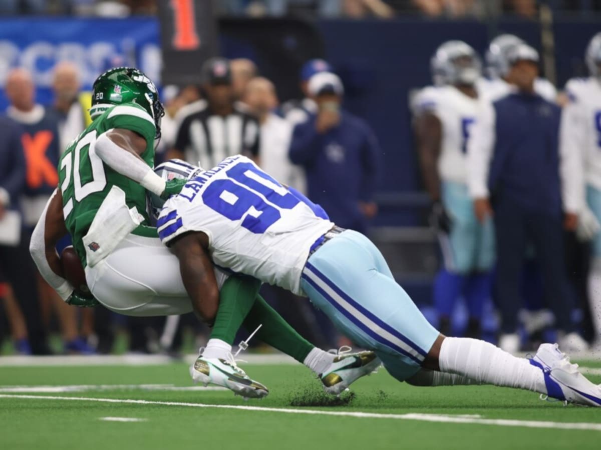 Dallas Cowboys defensive end Demarcus Lawrence (90) walks off the