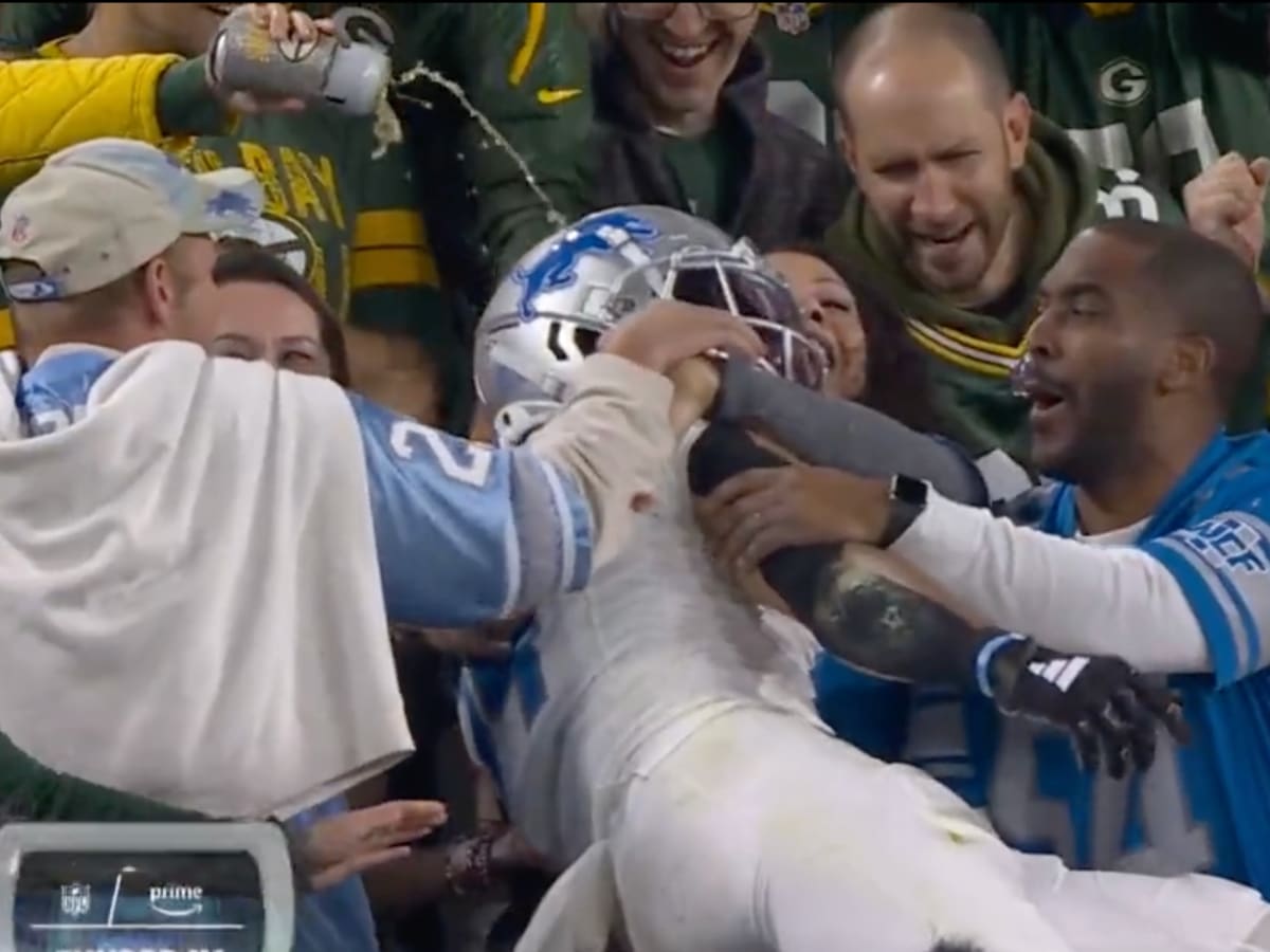 Packers Fan Pours Beer on Amon-Ra St. Brown After Lions TD