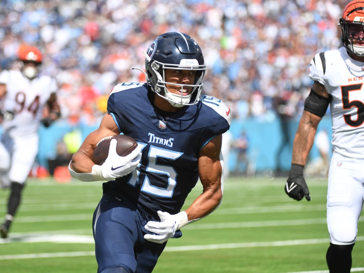 Derrick Henry bulldozes Bengals defense for TD, then throws for another in  Titans' blowout win