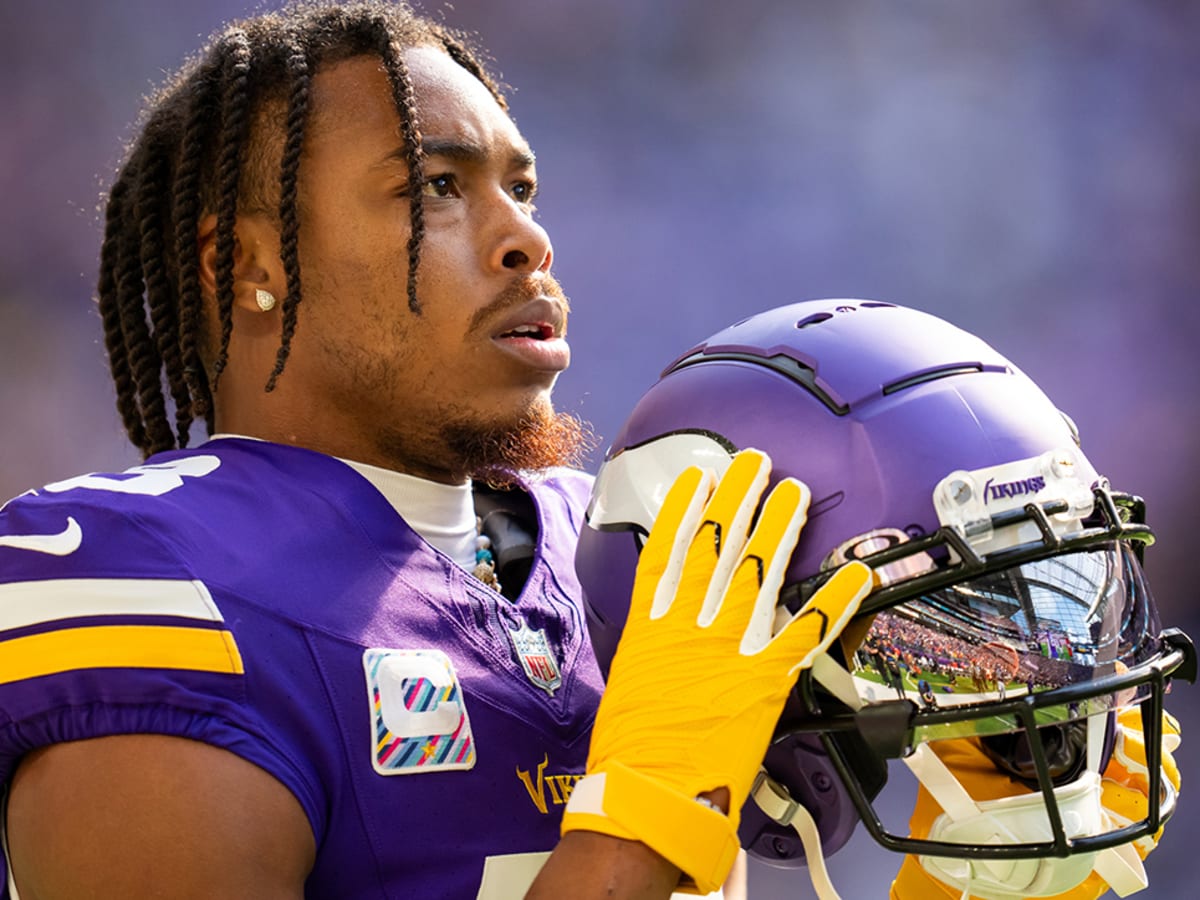 The Minnesota Vikings work out on the Rice Stadium playing field