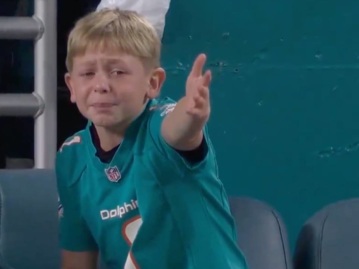 Young Dolphins Fan Was in Utter Disbelief Over Red Zone Penalty vs. Cowboys  - Sports Illustrated