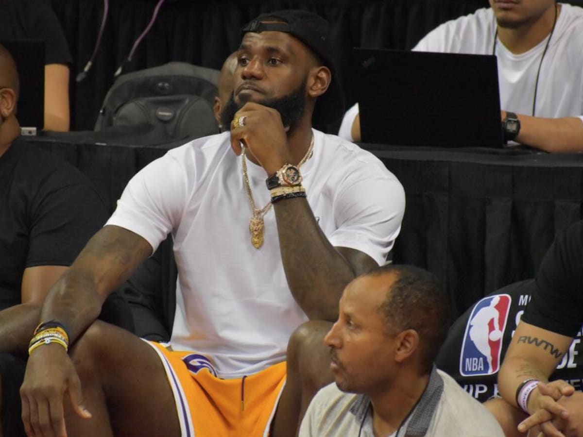 WATCH: Lakers' LeBron James gives game-worn sneakers and towel to young fan  in Sacramento 