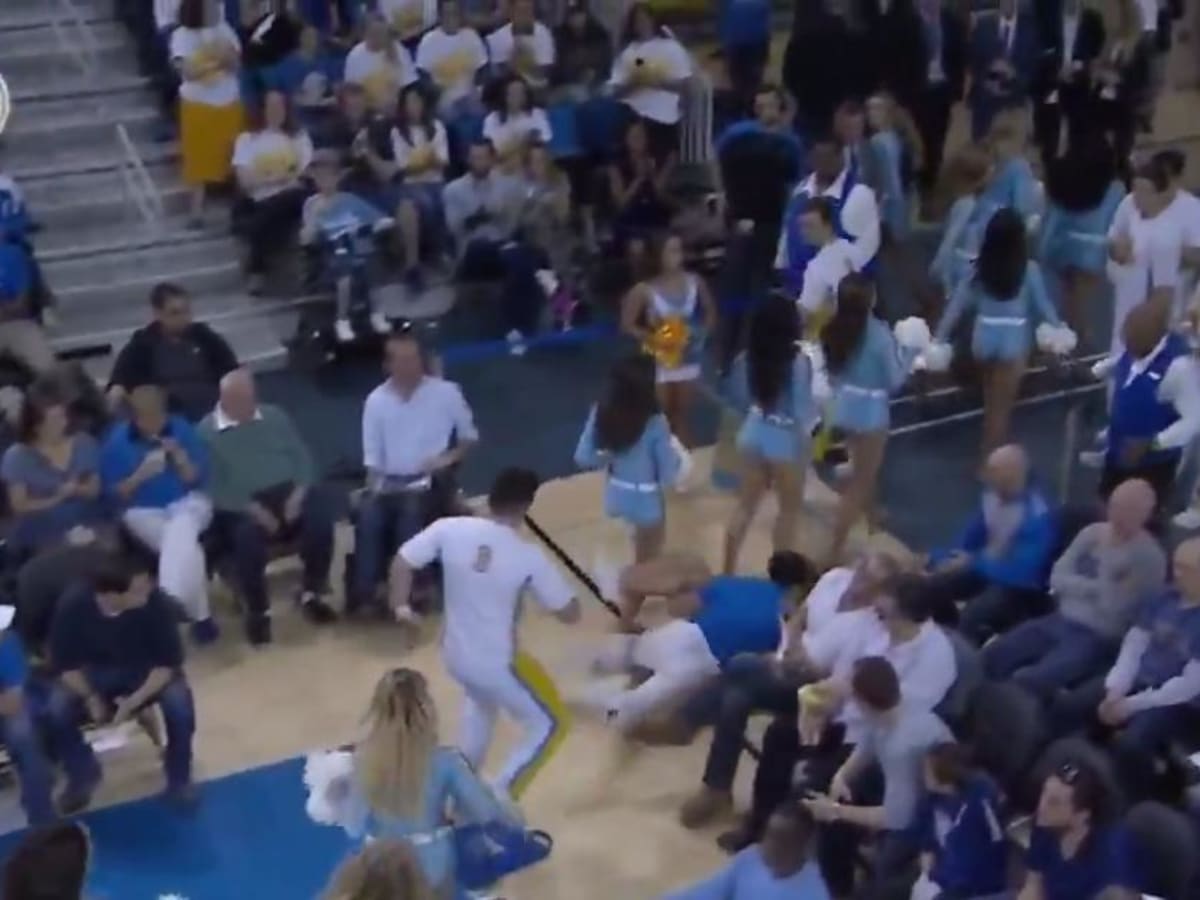 UCLA cheerleader falls, gets dropped by rescuer (video) - Sports Illustrated