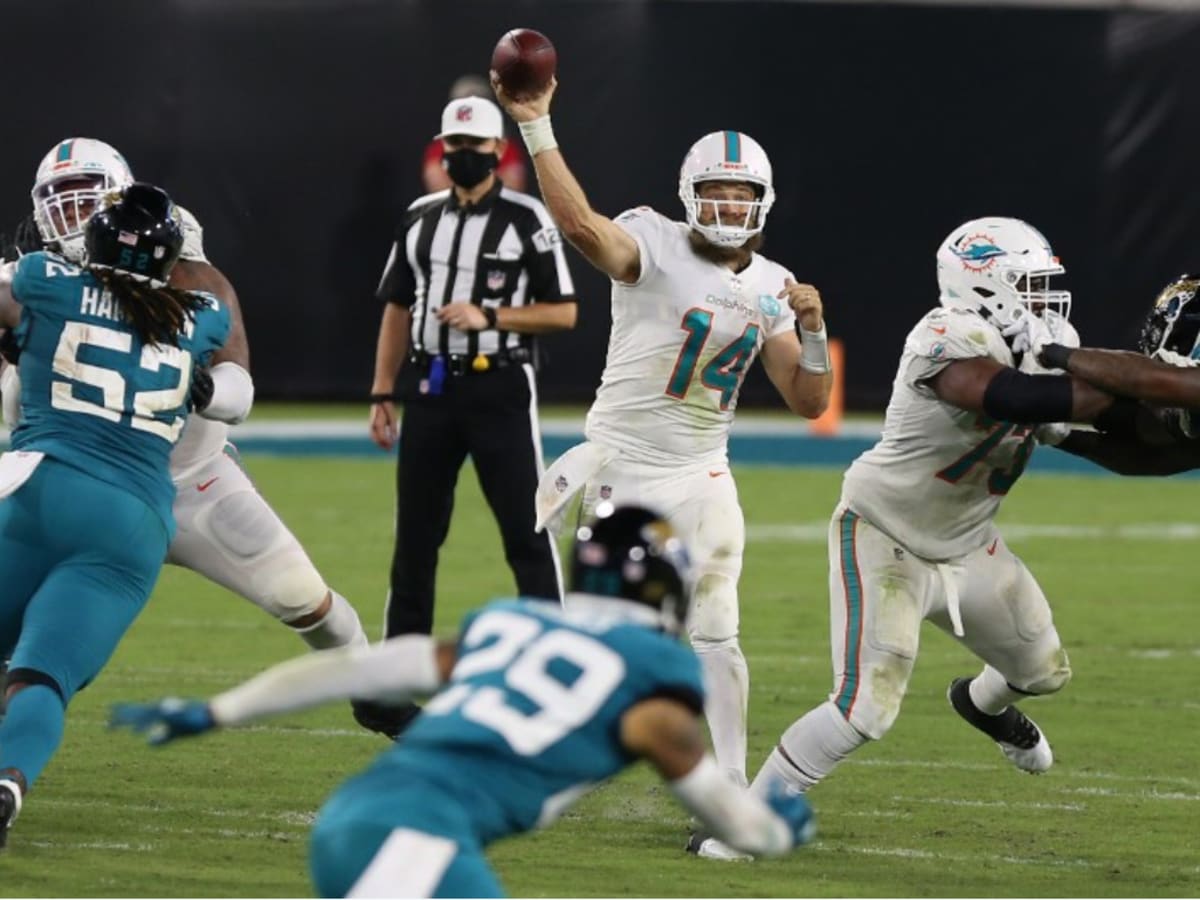 CBS Sports sideline reporter AJ Ross interviews Miami Dolphins quarterback  Tua Tagovailoa (1) on the field after the Dolphins defeated the Cleveland  Browns during an NFL football game, Sunday, Nov. 13, 2022