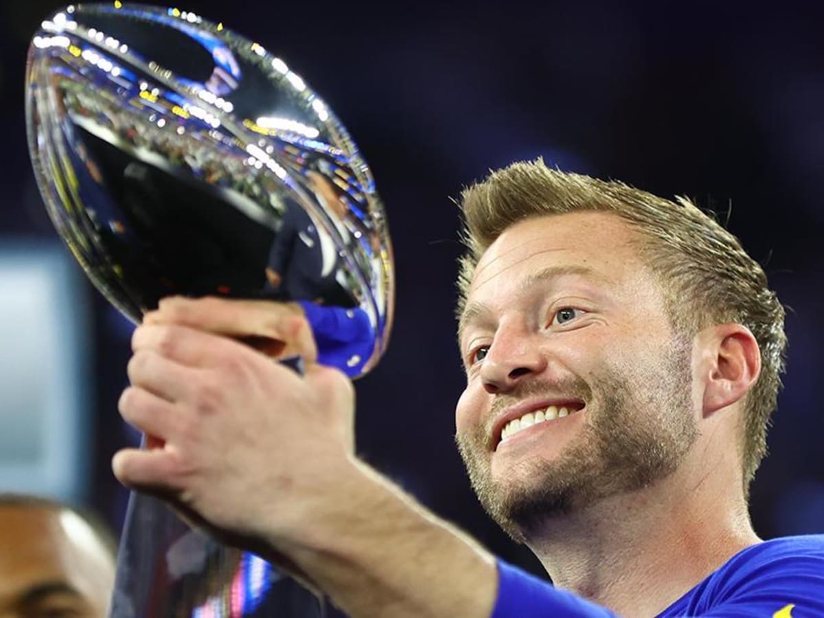 Los Angeles Rams' head coach Sean McVay holds the trophy after