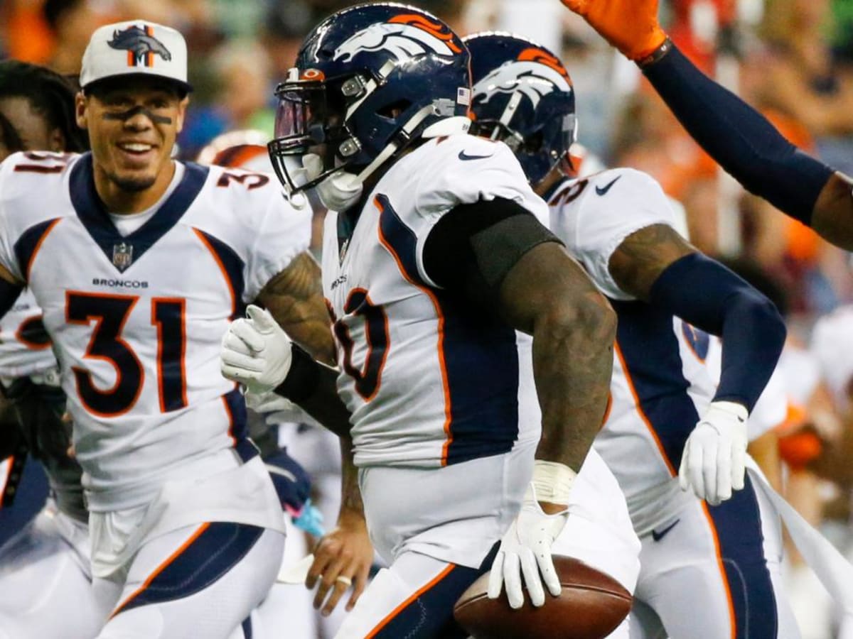 Broncos defense bails out AWOL offense with safety, two late