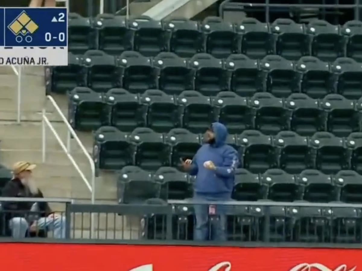 Fans rush field, accost Braves' Ronald Acuna Jr.