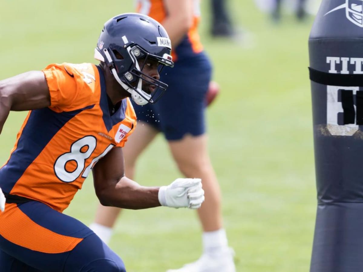 Denver Broncos tight end Chris Manhertz (84) takes part in drills