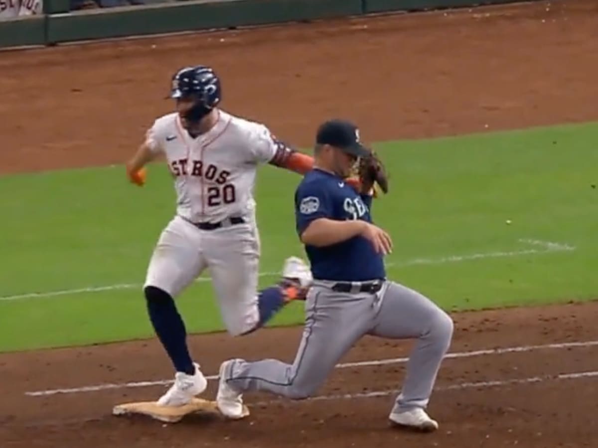 Fact Check: Did Chas McCormick try to knock the ball out of Ty France's  glove? Astros cheating claims emerge again