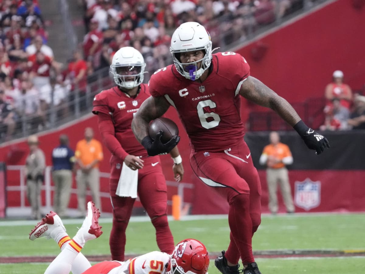 Arizona Cardinals' James Conner smiles as he heads off the field after the  team beat the Seattle Seahawks in an NFL football game, Sunday, Nov. 21,  2021, in Seattle. The Cardinals won