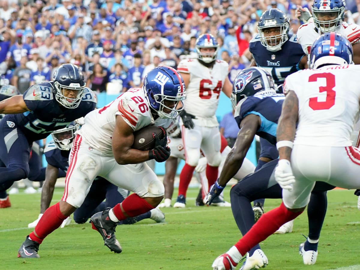 New York Giants running back Saquon Barkley (26) celebrates after making a  touchdown run against the Tennessee Titans during the second half of an NFL  football game Sunday, Sept. 11, 2022, in