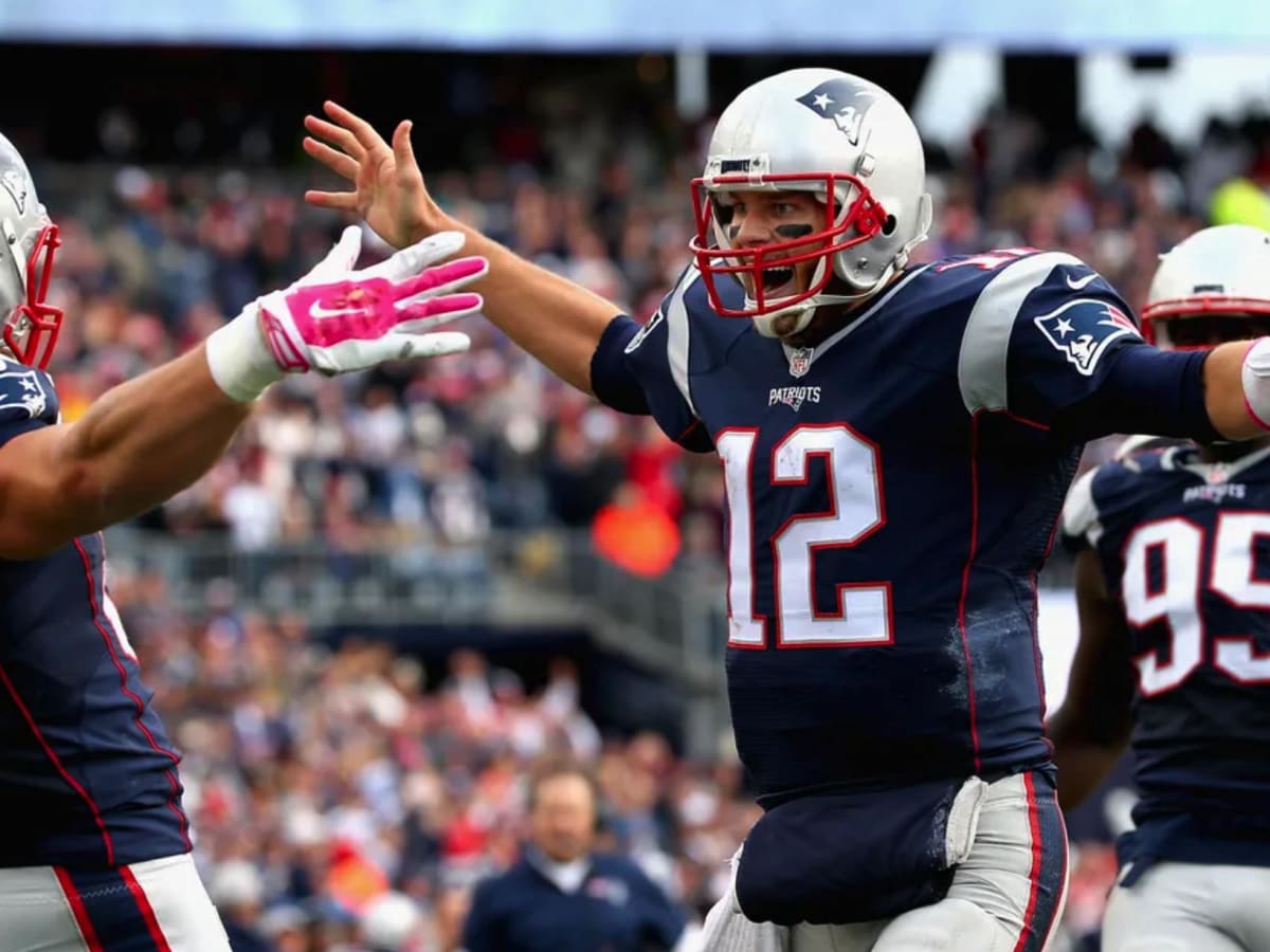 A fan wearing a Homer Simpson mask and a New England Patriots tight end Rob  Gronkowski jersey looks on from the stands against the Buffalo Bills during  the second half of an