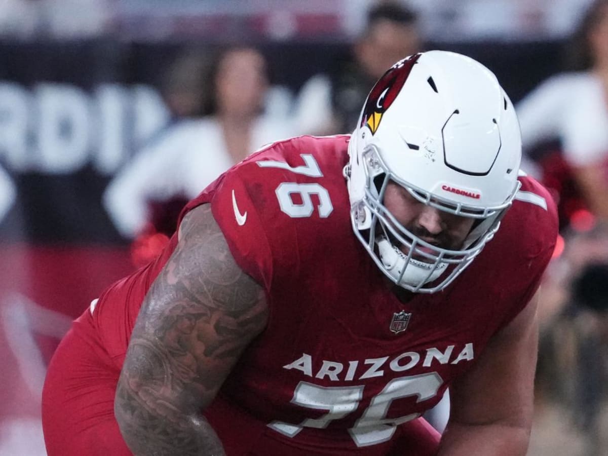 Arizona Cardinals guard Will Hernandez (76) wears a Mexico flag