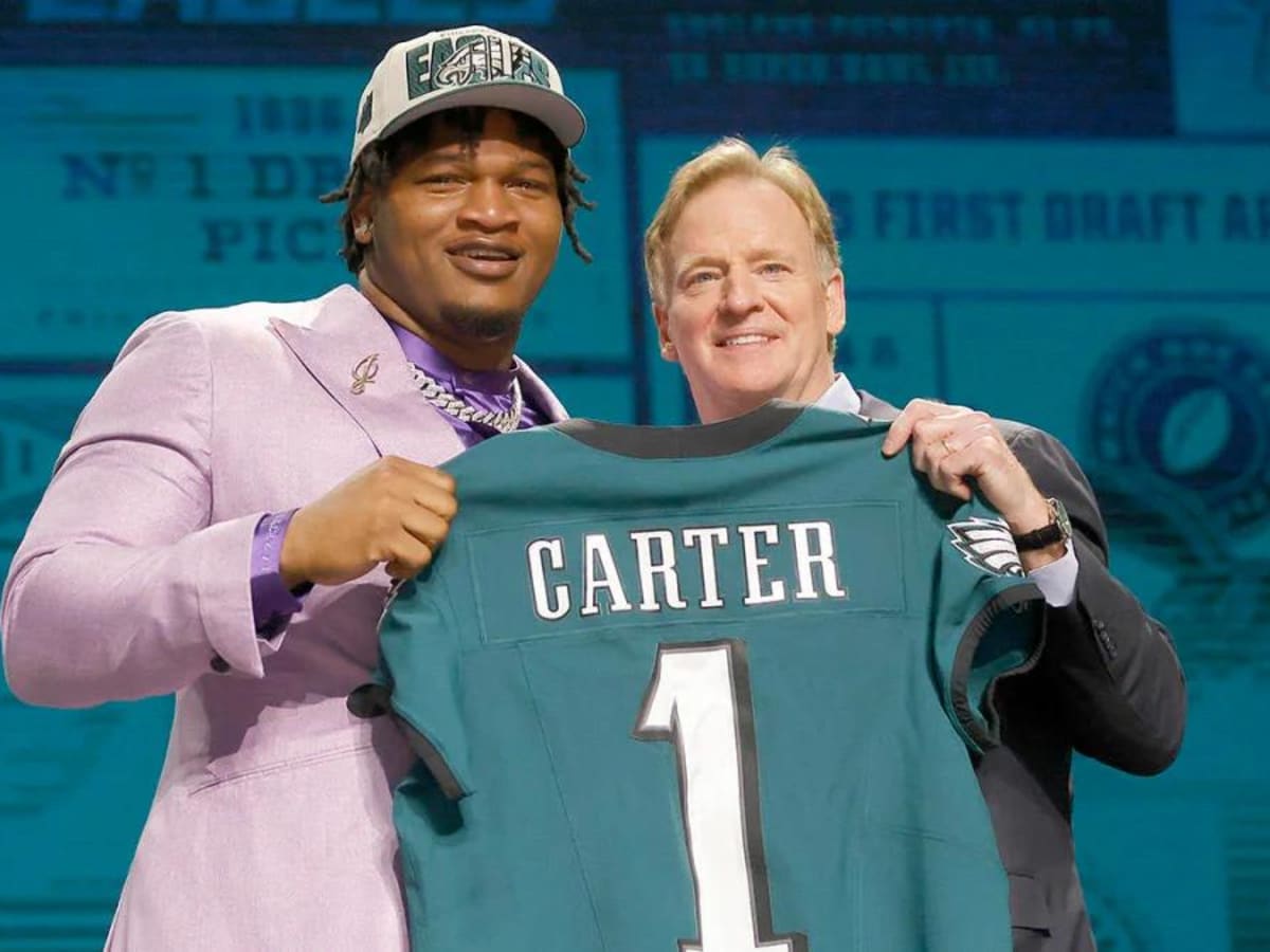 Georgia defensive lineman Jalen Carter, left, stands with NFL Commissioner  Roger Goodell after being chosen by the Philadelphia Eagles with the ninth overall  pick during the first round of the NFL football