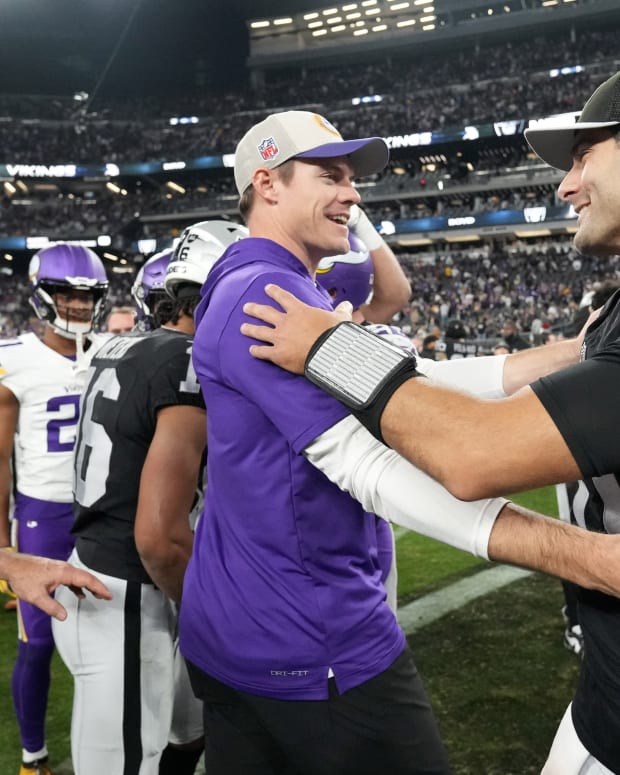 Dec 10, 2023; Paradise, Nevada, USA; Minnesota Vikings coach Kevin O'Connell (left) shakes hands with Las Vegas Raiders quarterback Jimmy Garoppolo (10) after the game at Allegiant Stadium.