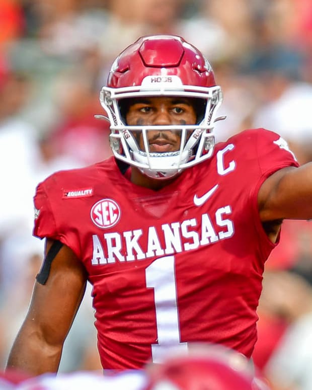 Razorbacks safety Jalen Catalon directs the secondary during a win over Georgia Southern last season at Razorback Stadium.