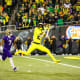 Oregon Ducks wide receiver Dont'e Thornton hauls in a touchdown against the Washington Huskies.