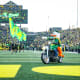 The Oregon Duck rides the motorcycle to lead the Ducks onto the field before kickoff against Washington.&nbsp;