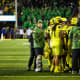 Oregon Ducks offensive lineman Ryan Walk sports a walking boot after getting injured against Washington.