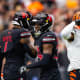 Cincinnati Bengals wide receiver Ja'Marr Chase (1) flexes as he celebrates a first down against the Arizona Cardinals in the first half at State Farm Stadium.