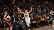 Warriors beat Heat 111-103 for 36th straight home win