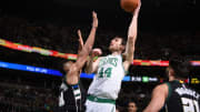 Zeller scores 26, Celtics down Bucks 124-109