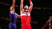 Gortat scores 21 points as Wizards upset Hornets, 113-98