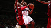 Wall, Beal each score 18, Wizards down Heat, 106-87