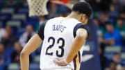 Anthony Davis suffers lower back contusion while tumbling into crowd