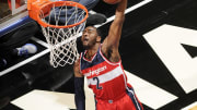 Wall helps Wizards beat Magic for 12th straight time, 105-99