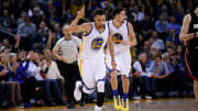 Stephen Curry, Warriors top Heat to stay undefeated at home