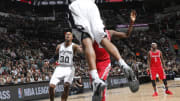 Spurs rebound from loss to Warriors, pound Rockets