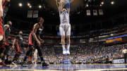 Magic come up big down stretch to stun Heat