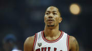 Bulls’ Derrick Rose exits game vs. Heat with back, hamstring injuries