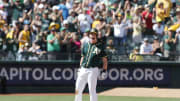 A's score 7 in seventh to beat Rays 8-2