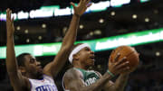 Thomas leads Celtics to 112-95 season-opening win over 76ers