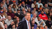 AP source: Sputtering Suns fire 2 assistant coaches