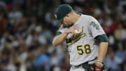 Valencia homers in 7-run 5th, A's rally past Mariners 11-5