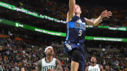 Mavericks rally from 18 down to beat Celtics 106-102