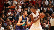 Bosh returns, Heat top Hornets 104-94 in season opener