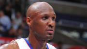 Report: Lamar Odom on life support, has improved slightly