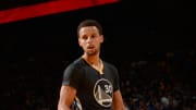 Curry leads Warriors past Nets 107-99 in overtime