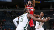 Wizards use late run to down Bucks