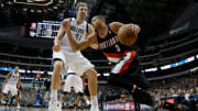 Trail Blazers' C.J. McCollum hates idea of 44-minute games