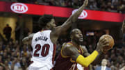 James, Love lead Cavaliers past Heat 102-92