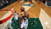 Bucks' Jabari Parker does on-court work before game