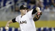 Happ pitches 6 innings to help Pirates beat Marlins 5-2