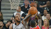 Aldridge's double-double lifts Spurs over 76ers