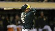 Athletics rally to beat Yankees 5-4