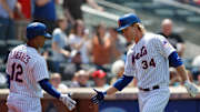 Syndergaard dazzles with bat and glove, Mets sweep Phillies